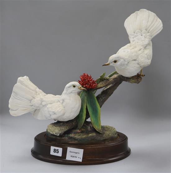 A bisque porcelain model of doves